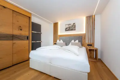 Ein Bett oder Betten in einem Zimmer der Unterkunft Vitalhotel Sonnenhof