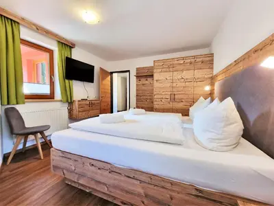 Ein Bett oder Betten in einem Zimmer der Unterkunft Ferienhaus Berghof