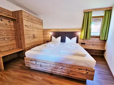 Ein Bett oder Betten in einem Zimmer der Unterkunft Ferienhaus Berghof