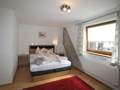 Ein Bett oder Betten in einem Zimmer der Unterkunft Apartment Brettfall Blick by Interhome
