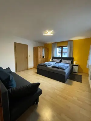 Ein Bett oder Betten in einem Zimmer der Unterkunft Haus Mariandl