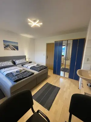 Ein Bett oder Betten in einem Zimmer der Unterkunft Haus Mariandl