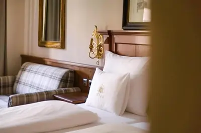 Ein Bett oder Betten in einem Zimmer der Unterkunft Hotel Bräu