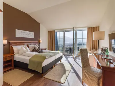 Ein Bett oder Betten in einem Zimmer der Unterkunft Hotel Panorama Royal