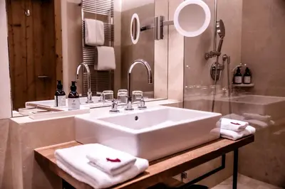 Ein Badezimmer in der Unterkunft Kitzhof Mountain Design Resort, 4 Sterne Superior