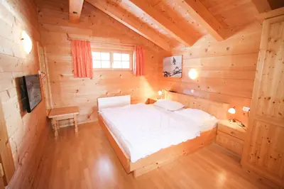 Ein Bett oder Betten in einem Zimmer der Unterkunft Chalet Königsleiten 297