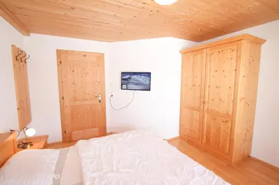 Ein Bett oder Betten in einem Zimmer der Unterkunft Chalet Königsleiten 297