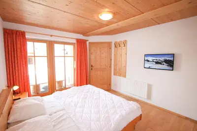 Ein Bett oder Betten in einem Zimmer der Unterkunft Chalet Königsleiten 297