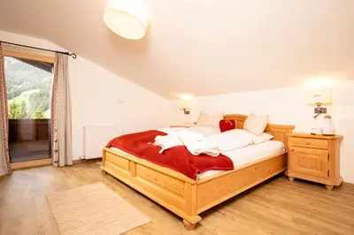 Ein Bett oder Betten in einem Zimmer der Unterkunft Bergwald Appartements Alpbach