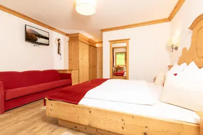 Ein Bett oder Betten in einem Zimmer der Unterkunft Bergwald Appartements Alpbach