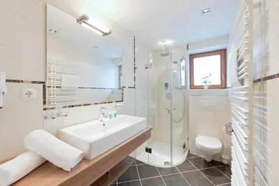 Ein Badezimmer in der Unterkunft Aktivhotel Schweizerhof Kitzbühel