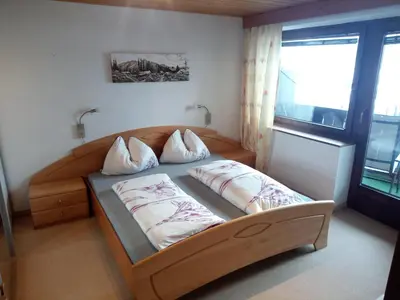 Ein Bett oder Betten in einem Zimmer der Unterkunft Ferienhaus Kröll