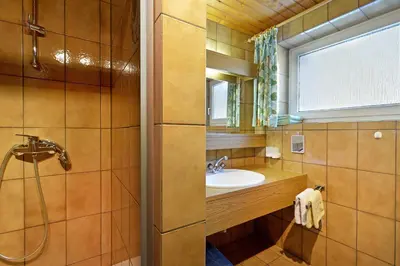 Ein Badezimmer in der Unterkunft Ferienhaus Kröll