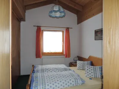 Ein Bett oder Betten in einem Zimmer der Unterkunft Ferienwohnungen Lemberger