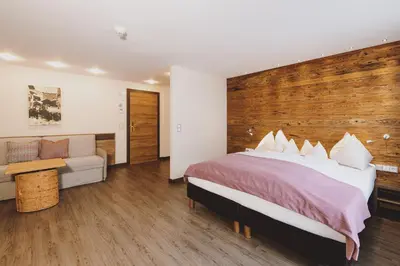 Ein Bett oder Betten in einem Zimmer der Unterkunft Hotel DIE SONNE