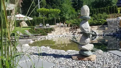 Ein Garten an der Unterkunft Hotel Alpenpanorama