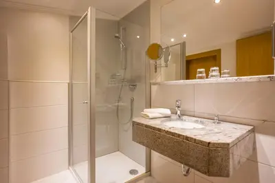 Ein Badezimmer in der Unterkunft Das Rotspitz Adults - only