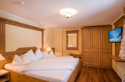 Ein Bett oder Betten in einem Zimmer der Unterkunft Das Rotspitz Adults - only