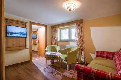Ein Sitzbereich in der Unterkunft Das Rotspitz Adults - only