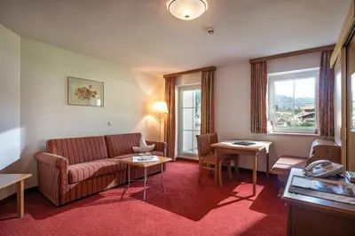 Ein Sitzbereich in der Unterkunft Hotel Maria Theresia