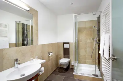 Ein Badezimmer in der Unterkunft Hotel Flatscher