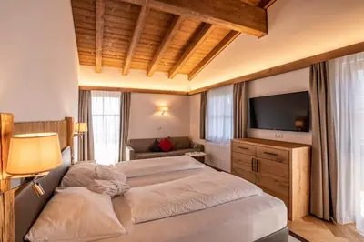 Ein Bett oder Betten in einem Zimmer der Unterkunft Hotel Hochfilzer