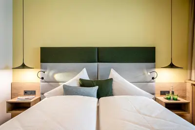 Ein Bett oder Betten in einem Zimmer der Unterkunft Hotel Klingler
