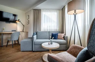 Ein Sitzbereich in der Unterkunft Hotel Klingler