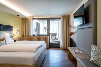 Ein Bett oder Betten in einem Zimmer der Unterkunft Hotel Klingler