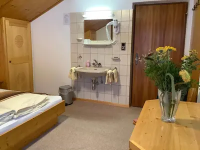 Ein Bett oder Betten in einem Zimmer der Unterkunft Anja's Schönblick - Bed & Breakfast