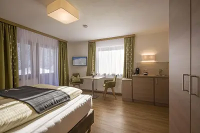 Ein Bett oder Betten in einem Zimmer der Unterkunft Anja's Schönblick - Bed & Breakfast