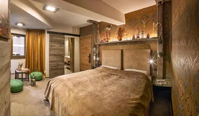 Ein Bett oder Betten in einem Zimmer der Unterkunft Boutique Hotel im Auracher Löchl