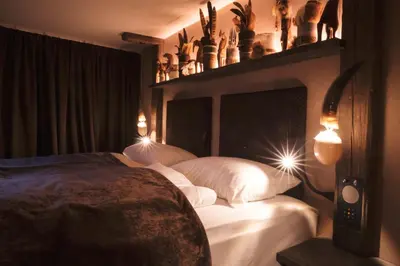 Ein Bett oder Betten in einem Zimmer der Unterkunft Boutique Hotel im Auracher Löchl