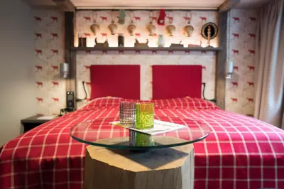 Ein Bett oder Betten in einem Zimmer der Unterkunft Boutique Hotel im Auracher Löchl
