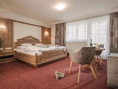 Ein Bett oder Betten in einem Zimmer der Unterkunft Platzlhof - Mein Hotel im Zillertal
