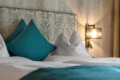 Ein Bett oder Betten in einem Zimmer der Unterkunft Platzlhof - Mein Hotel im Zillertal