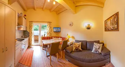 Ein Sitzbereich in der Unterkunft Romantik Aparthotel Sonnleitn