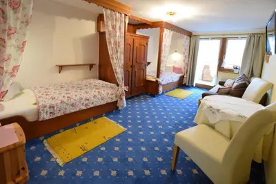 Ein Bett oder Betten in einem Zimmer der Unterkunft Romantik Aparthotel Sonnleitn