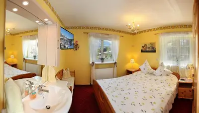 Ein Bett oder Betten in einem Zimmer der Unterkunft Romantik Aparthotel Sonnleitn