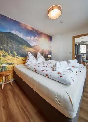 Ein Bett oder Betten in einem Zimmer der Unterkunft Saalbacher Perle 1 - Luxury Family Home