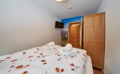 Ein Bett oder Betten in einem Zimmer der Unterkunft Saalbacher Perle 1 - Luxury Family Home
