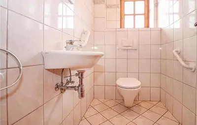 Ein Badezimmer in der Unterkunft Ferienhaus In Ruhiger Lage