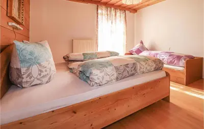 Ein Bett oder Betten in einem Zimmer der Unterkunft Ferienhaus In Ruhiger Lage