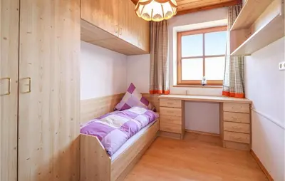 Ein Bett oder Betten in einem Zimmer der Unterkunft Ferienhaus In Ruhiger Lage