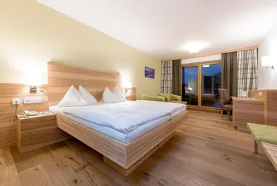 Ein Bett oder Betten in einem Zimmer der Unterkunft Hotel Leonhard
