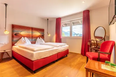 Ein Bett oder Betten in einem Zimmer der Unterkunft Hotel Bruggwirt