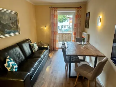 Ein Sitzbereich in der Unterkunft Alpenlodge, Ferienwohnung 2
