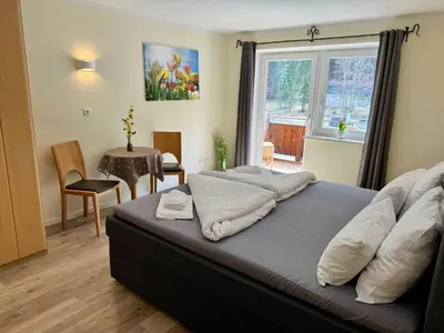Ein Sitzbereich in der Unterkunft Alpenlodge, Ferienwohnung 4