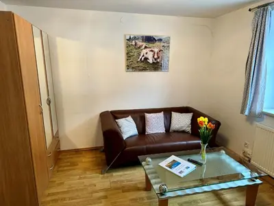 Ein Sitzbereich in der Unterkunft Alpenlodge, Ferienwohnung 6