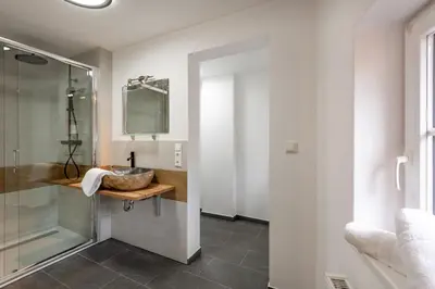 Ein Badezimmer in der Unterkunft Alpenlodge, Ferienwohnung 8